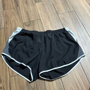 Nike Black and White Asymmetrical Crop Top